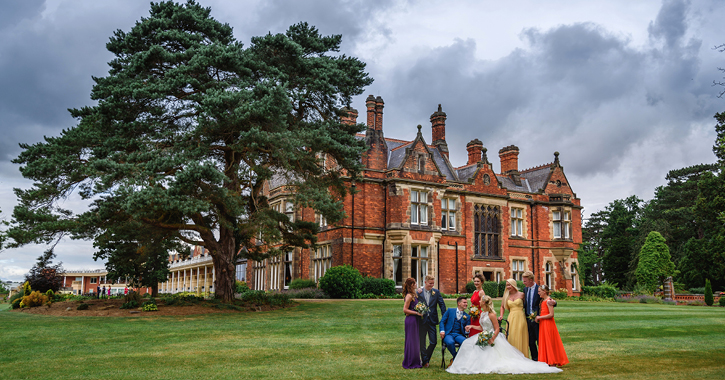 wedding party on the green outside Rockliffe Hall Hotel